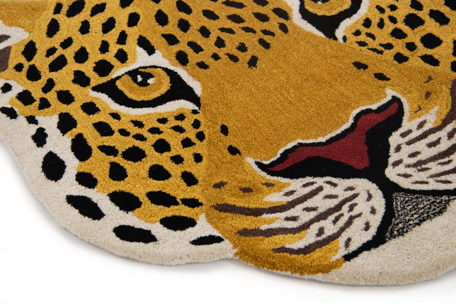 Leopard-themed rug with detailed design.