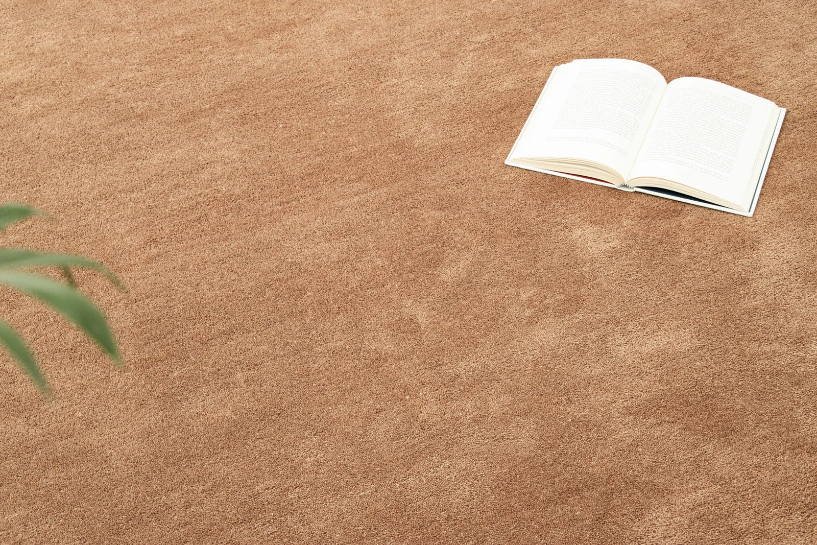 Tuscany brown wool rug in a living room setting