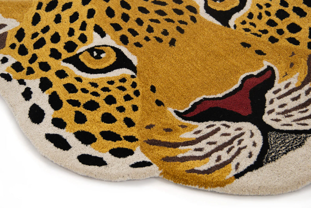 Leopard-themed rug with detailed design.