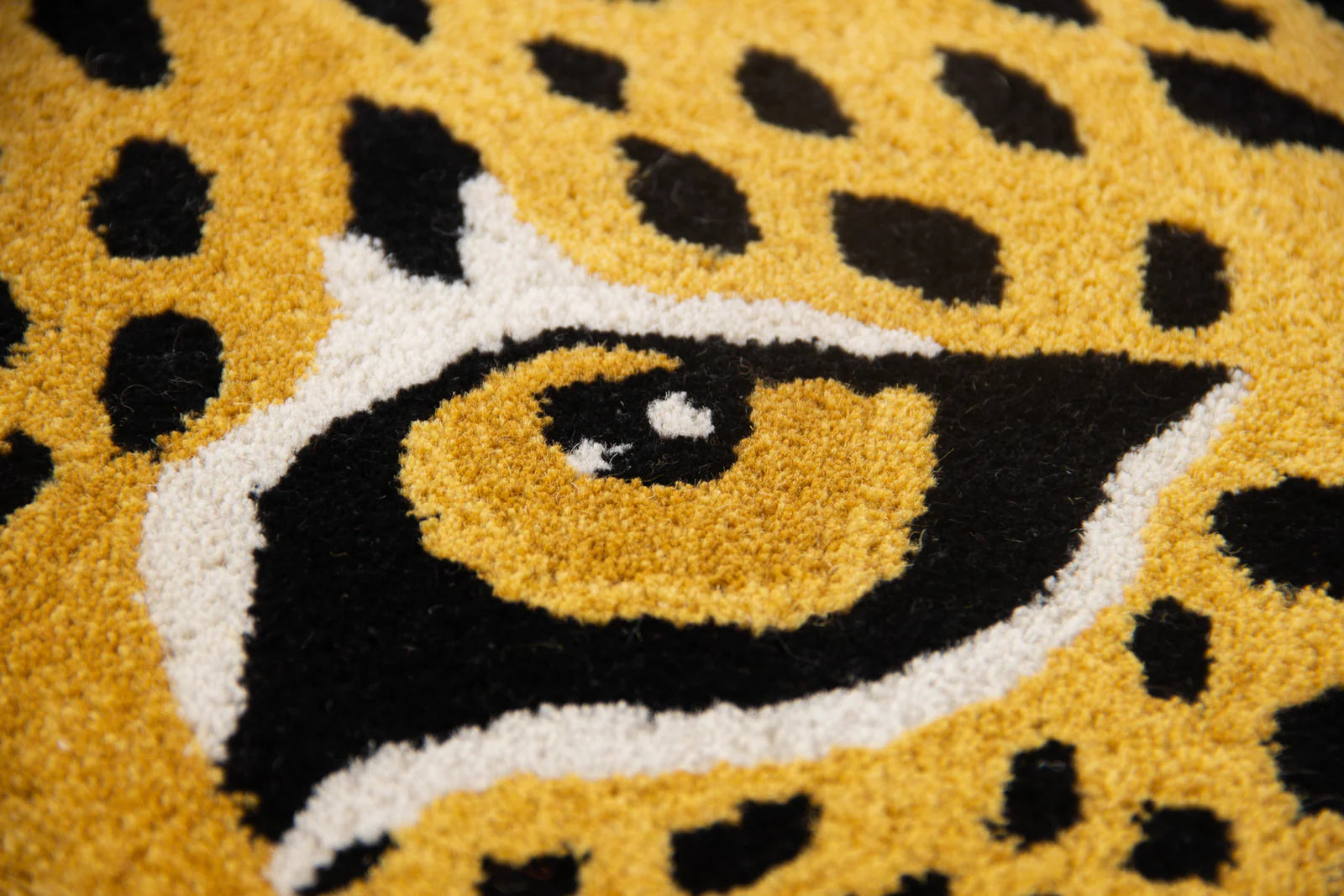 Close-up of the leopard print wool rug