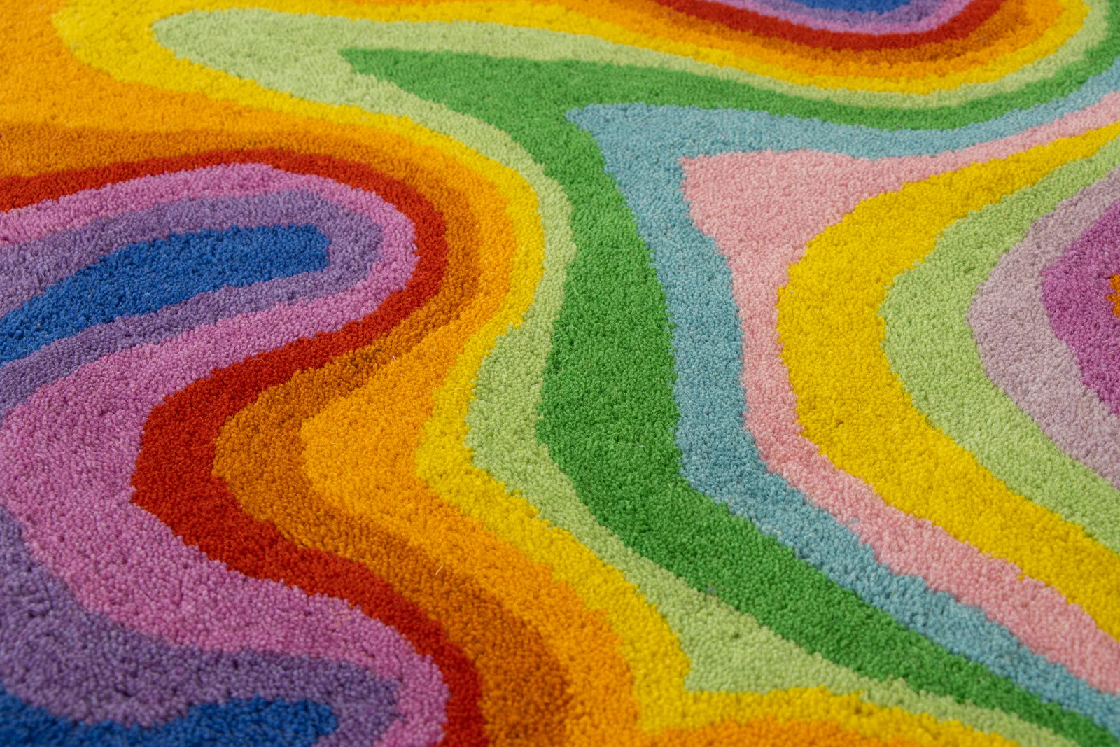 Colorful abstract pattern with wavy lines in various colors.